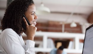 woman-on-phone-in-office-setting